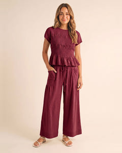 Smocked top and wide-leg pants set in burgundy, full length