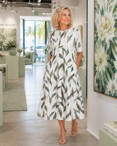 Green leaf midi dress worn with nude sandals