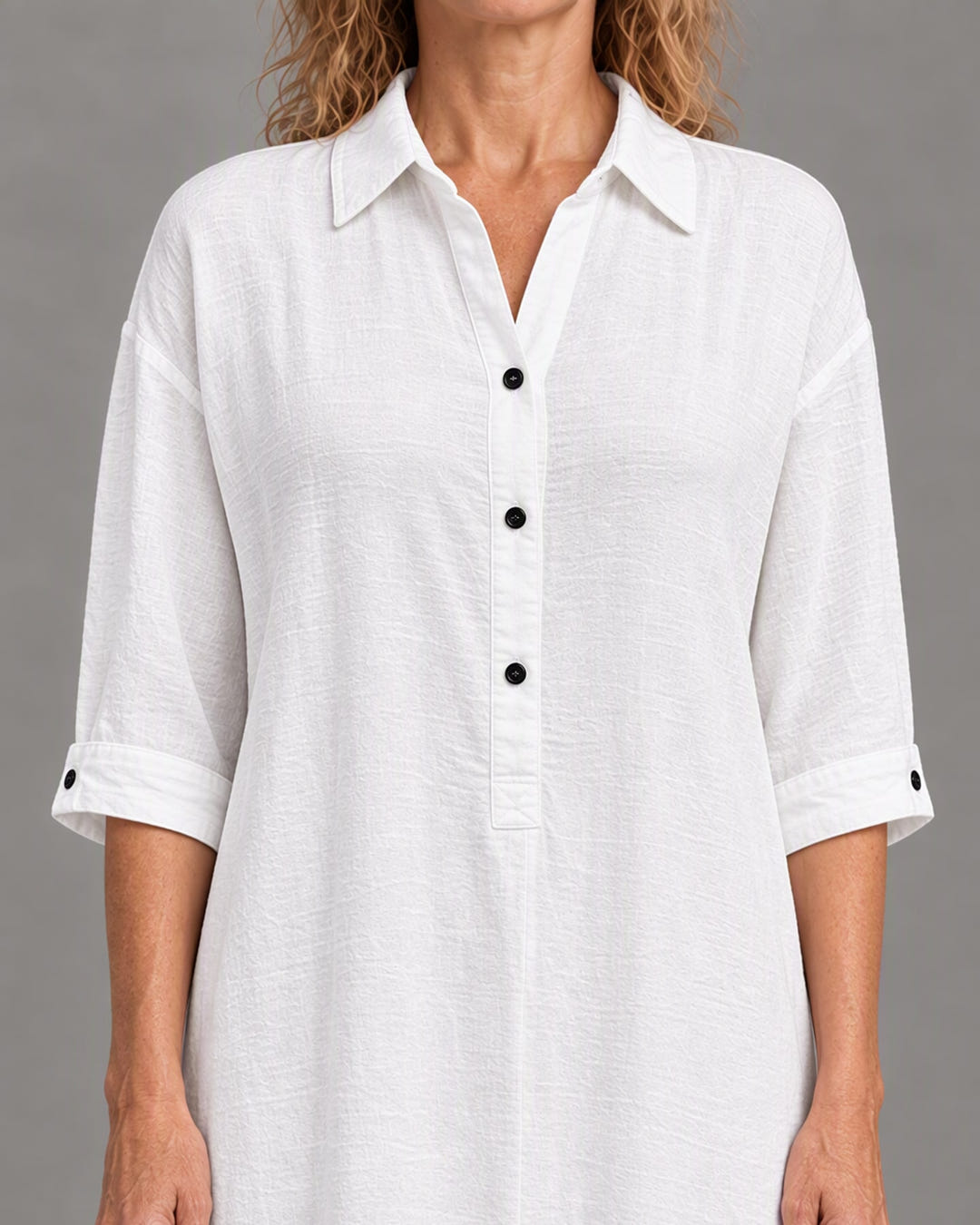 Close-up of the collar, buttons, cuff and crinkled linen-look weave