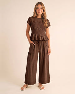 Smocked top and wide-leg pants set in brown, full length