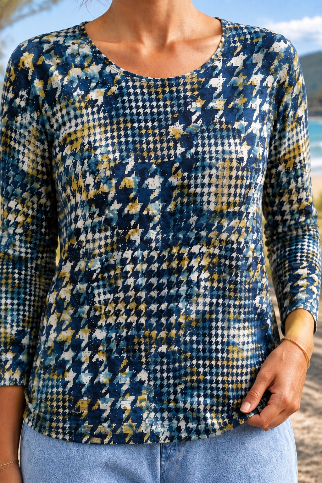 Saffron blouse, close-up of the neckline and print