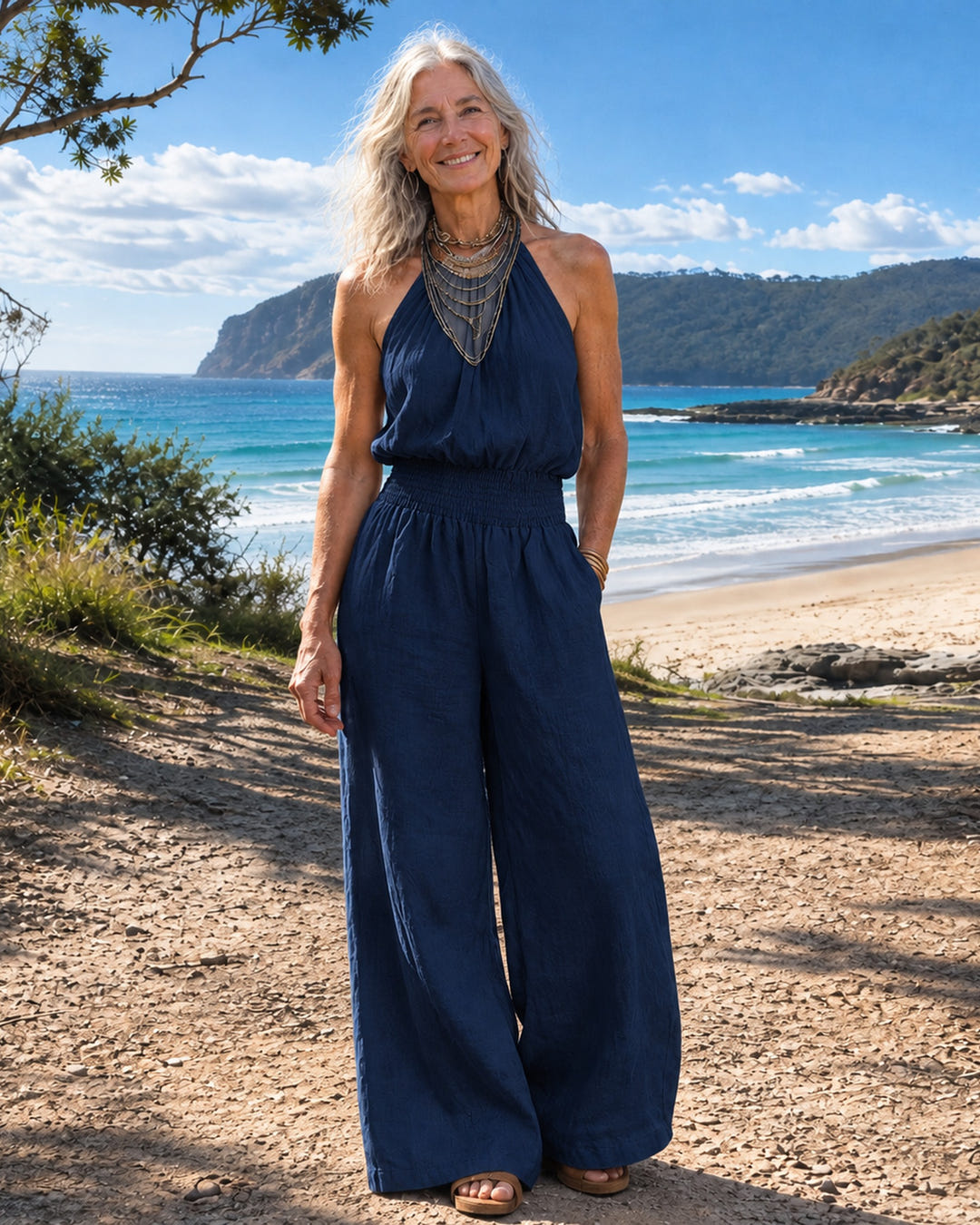 Dagny | Halter-Neck Smocked Linen Jumpsuit on Bruny Island, Navy Blue colourway