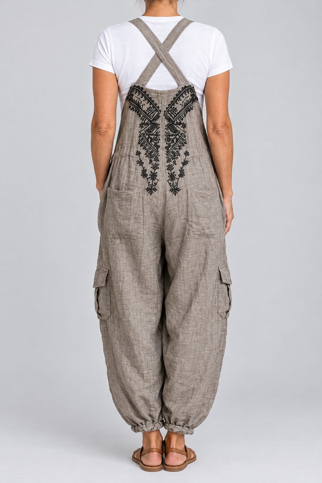 Boho halter dungarees in grey from the back, crossed straps