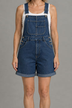 Close-up of the bib pocket, buckled straps, side buttons and rolled cuffs
