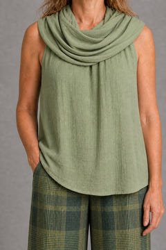 Close-up of the draped cowl collar, the crinkled crepe and the plaid