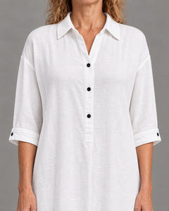 Close-up of the collar, buttons, cuff and crinkled linen-look weave